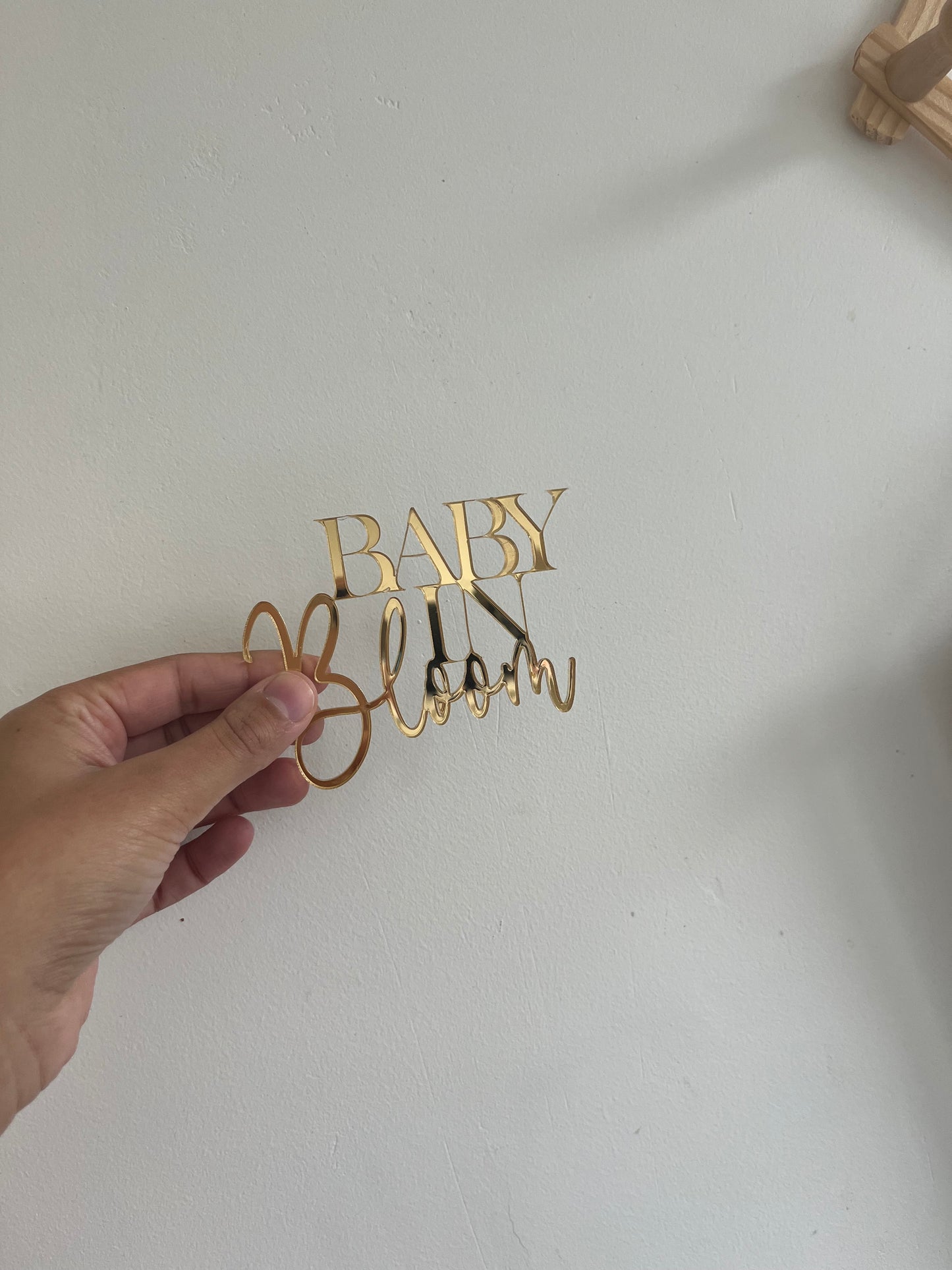 “Baby in bloom” cake charm