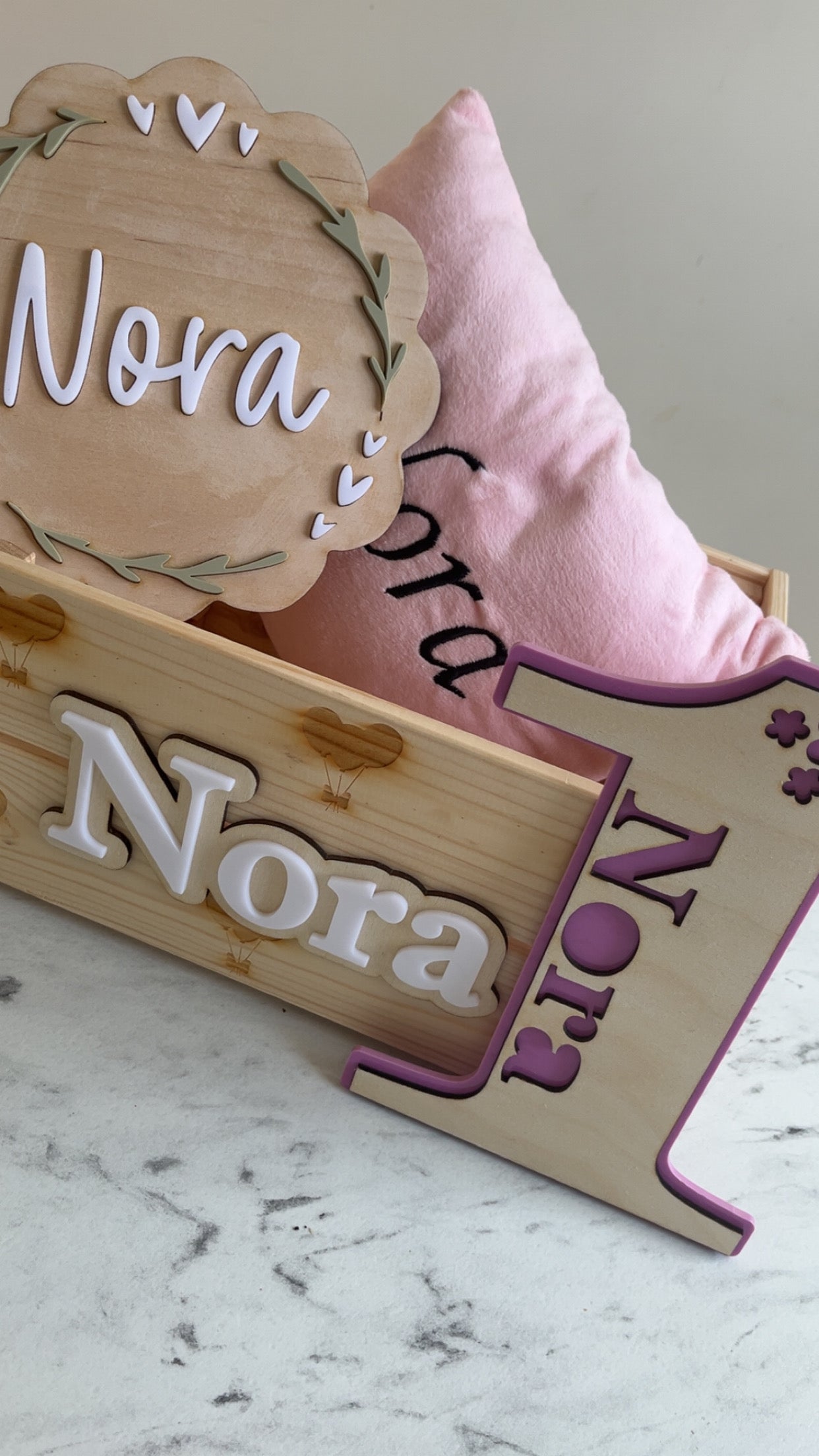 Double layered age and name sign