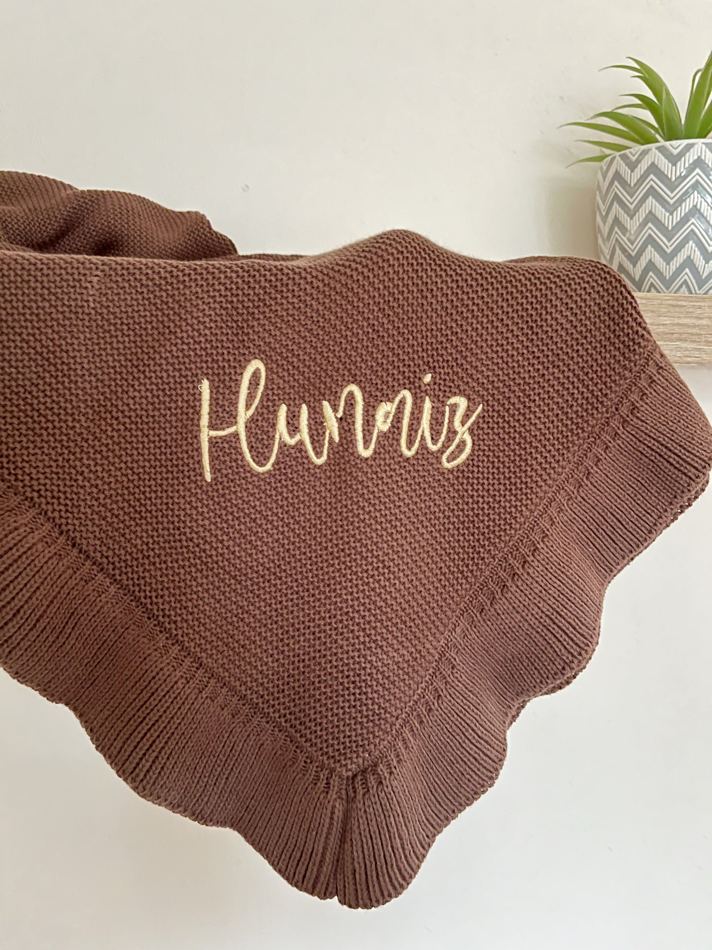Knitted ruffle edge personalised blanket