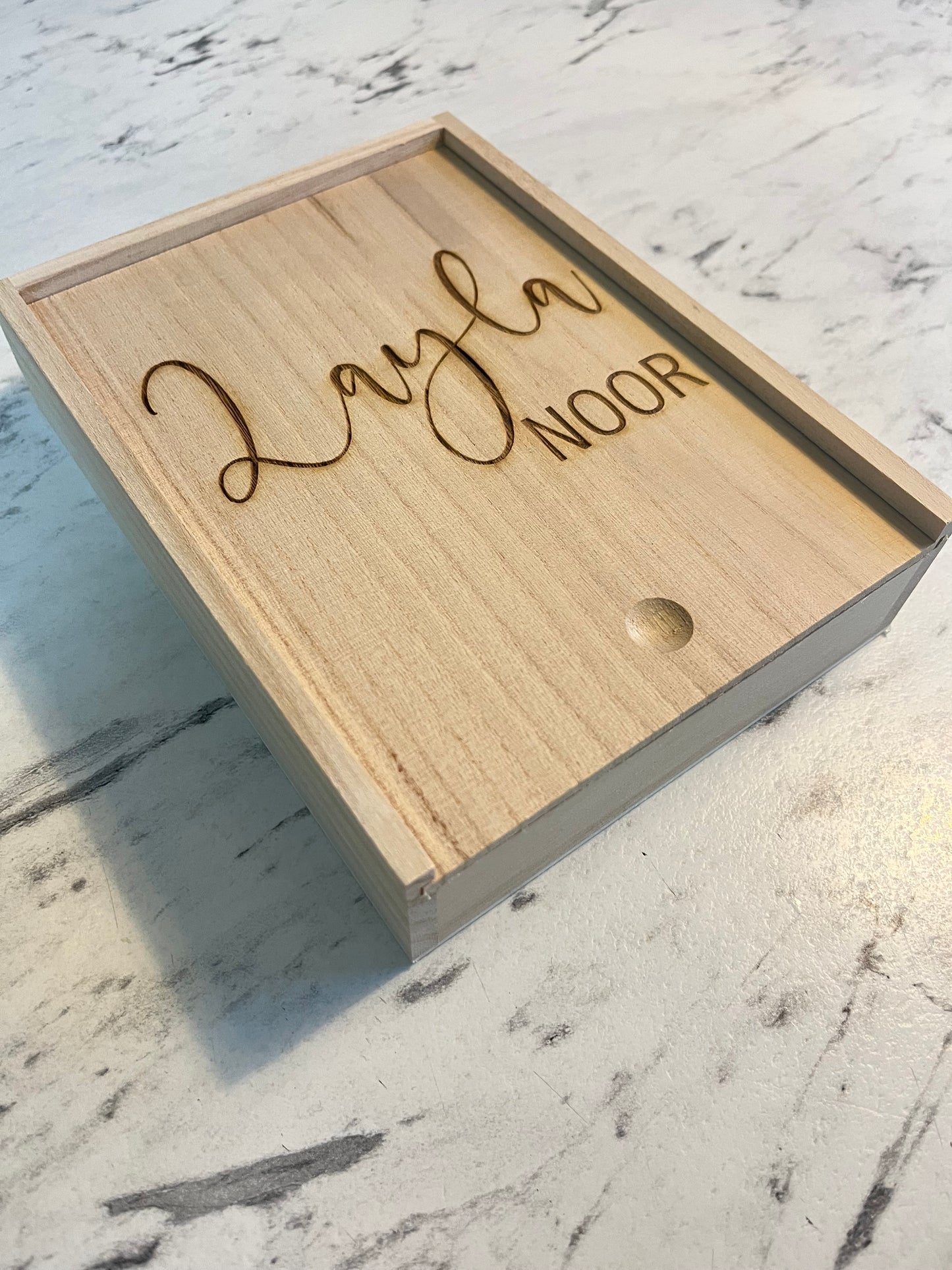 Keepsake box with sliding lid