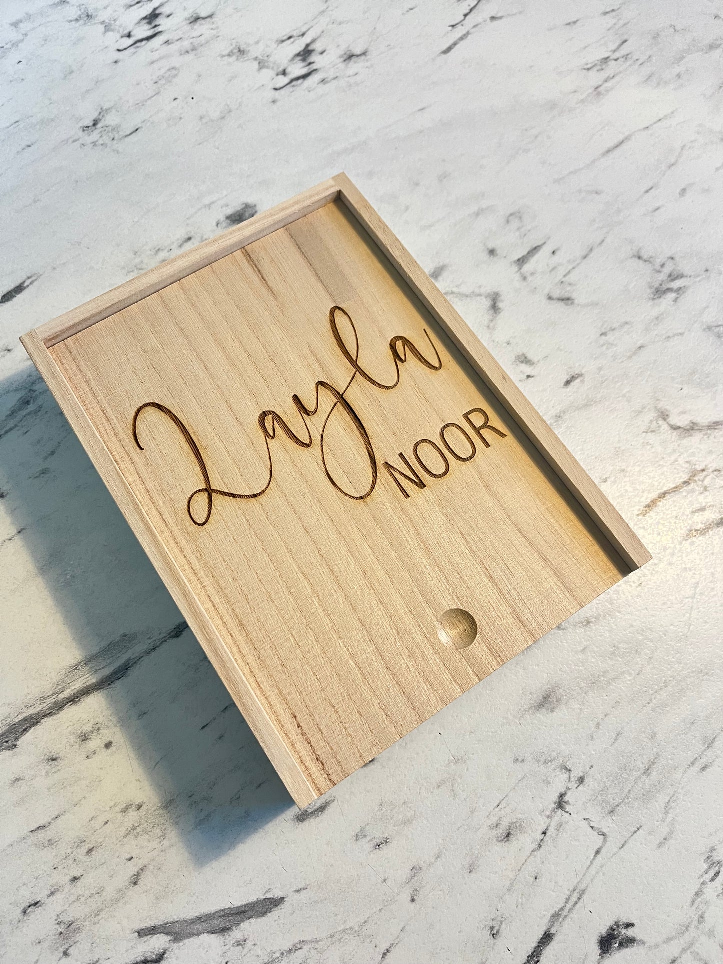 Keepsake box with sliding lid