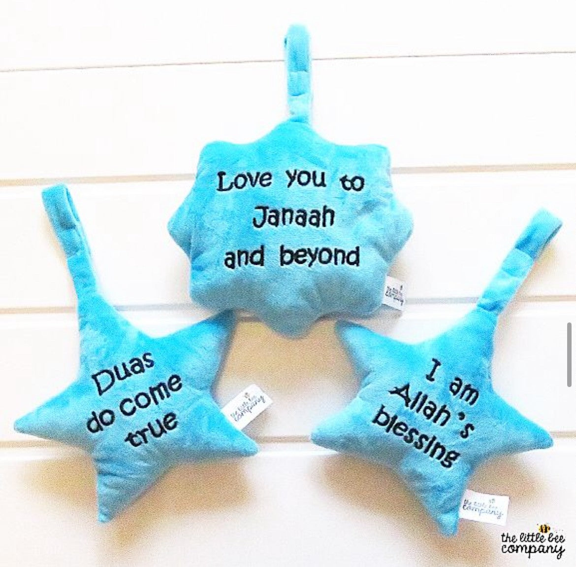 Hanging trio plush toy with bell