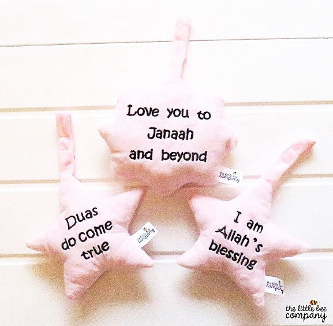 Hanging trio plush toy with bell